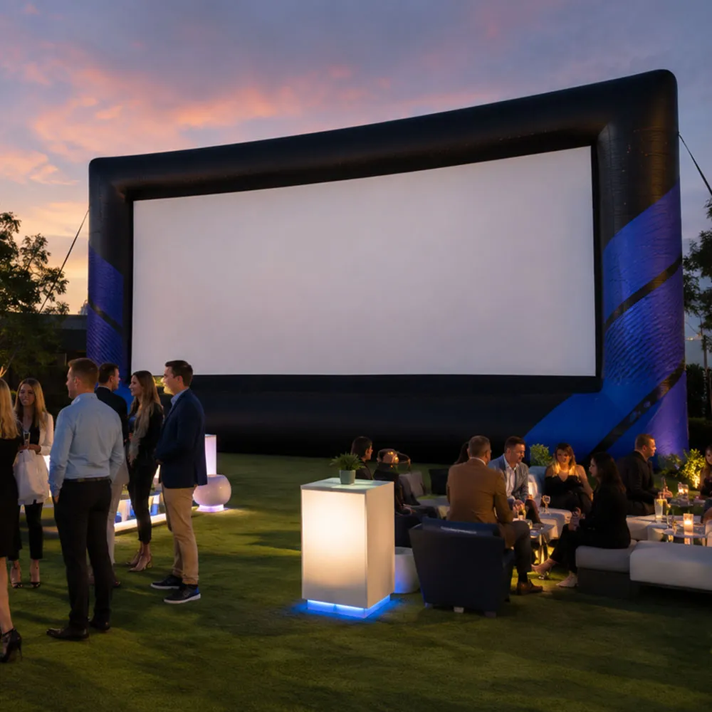 A branded outdoor screen at a corporate brand activation at night